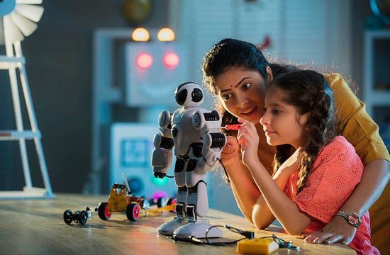 Girl building a robot at a Techradiance STEM lab
