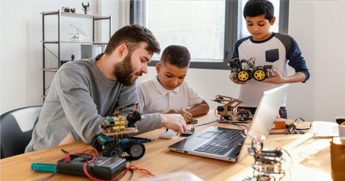 Students working in a school robotics and AI lab